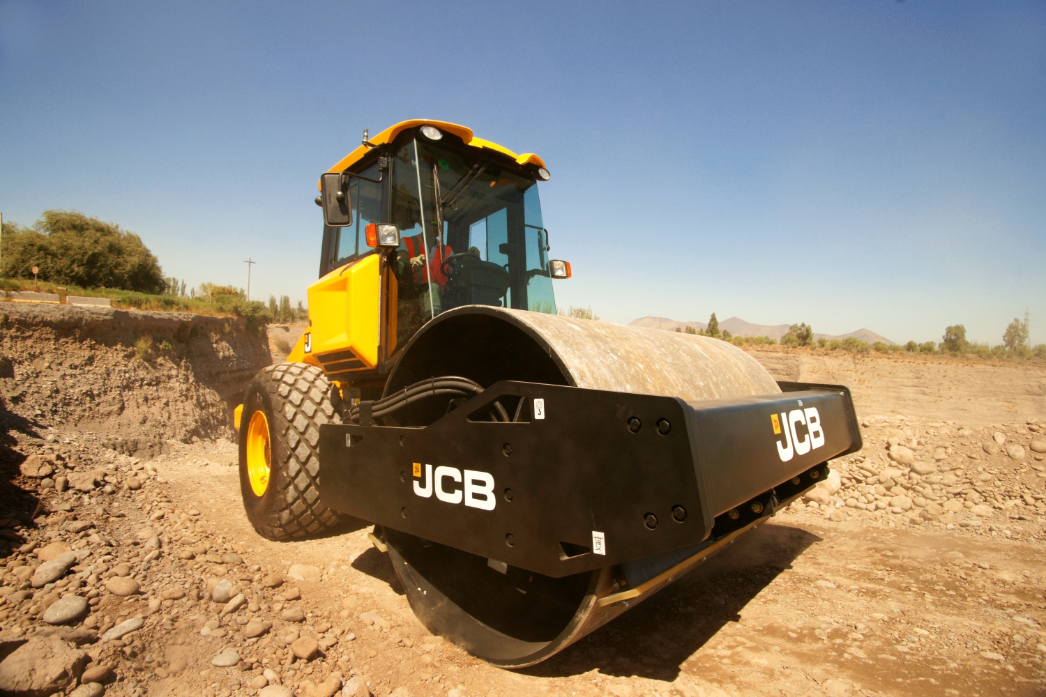 Грунтовый каток. JCB 116d. Грунтовый каток JCB 116. Каток JCB 116d. JCB Vibromax VM 116d.